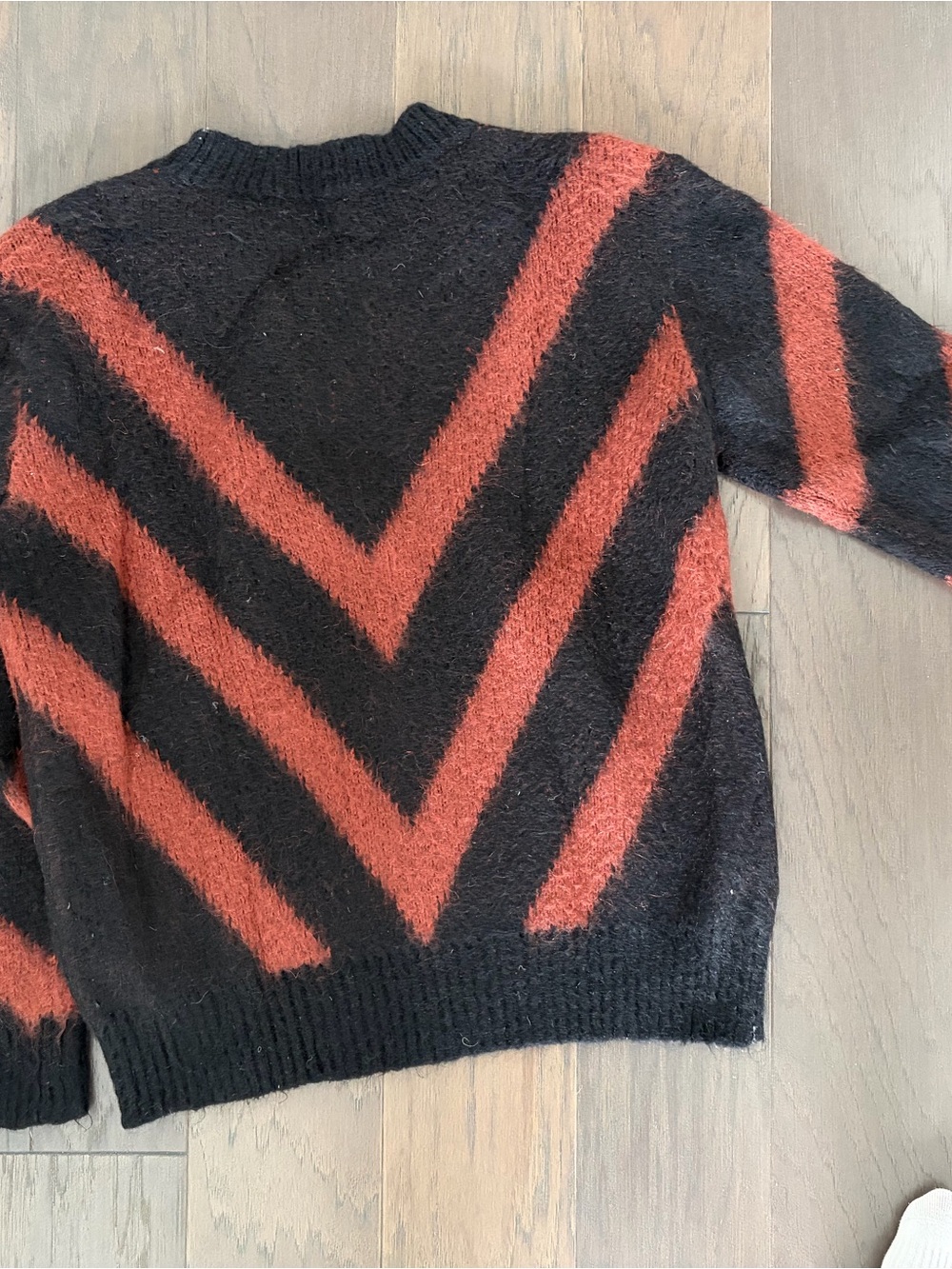 Sandro Paris Crewneck Sweater in Black with Rust Chevron Stripes